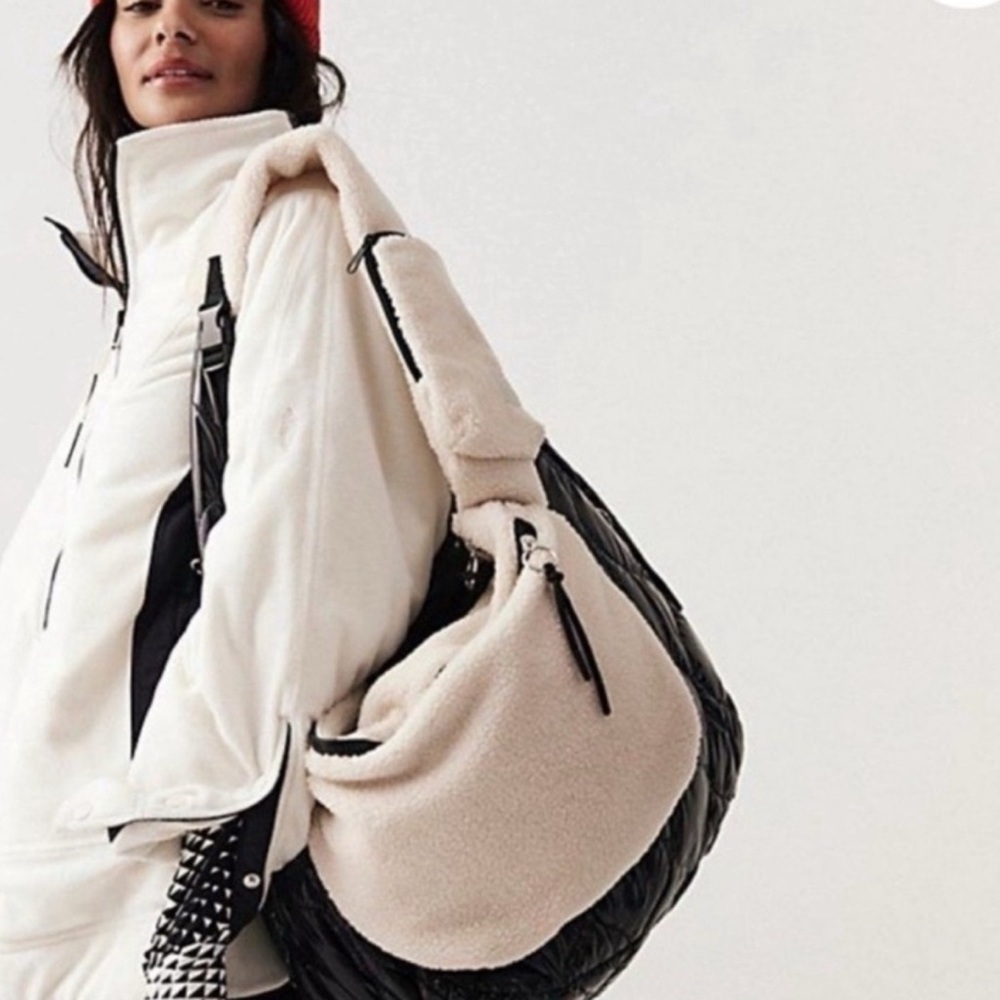 NWT free people movement women’s over achiever, Sherpa sling in cream